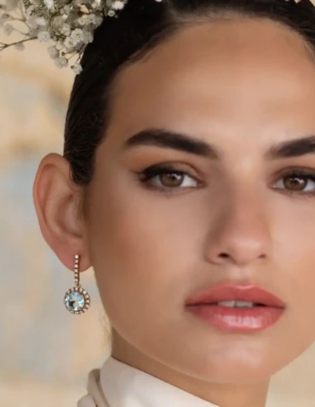 Small cubic zirconia earrings with an aquamarine stone