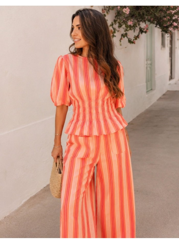 Striped blouse and pants set in shades of orange