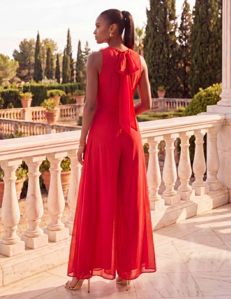 Flowy long jumpsuit in chiffon fabric with a bow detail