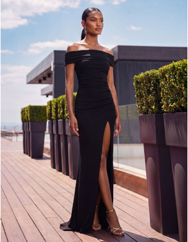 Long black guest dress with a Bardot neckline