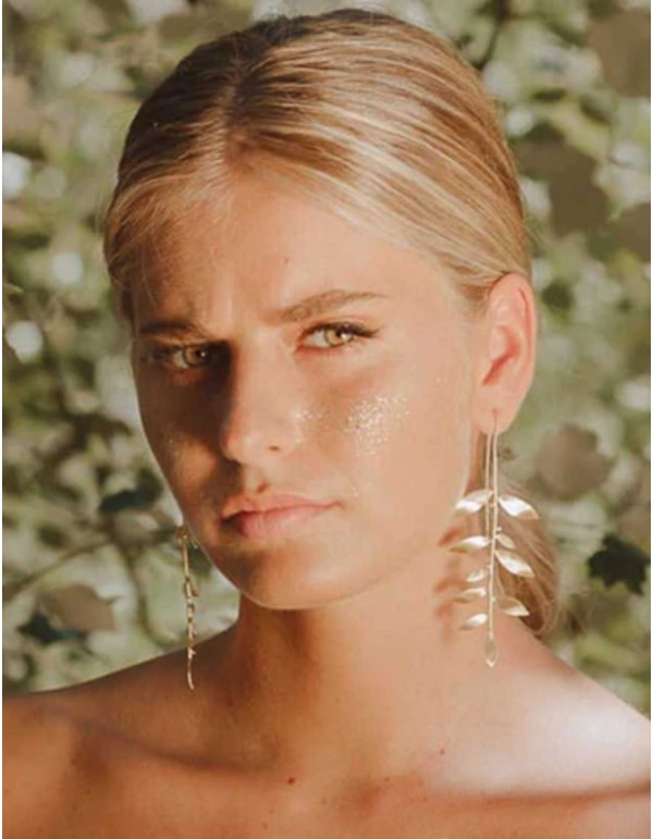 Long gold leaf-shaped earrings