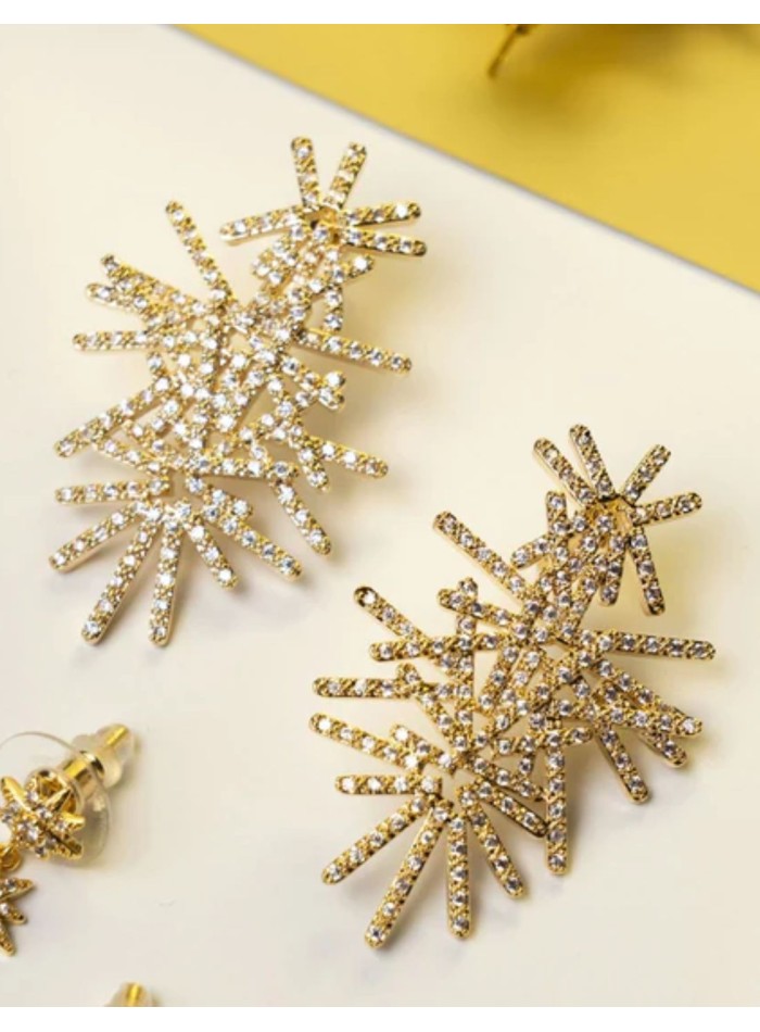 Boucles d'oreilles dorées ornées de zircons, au...