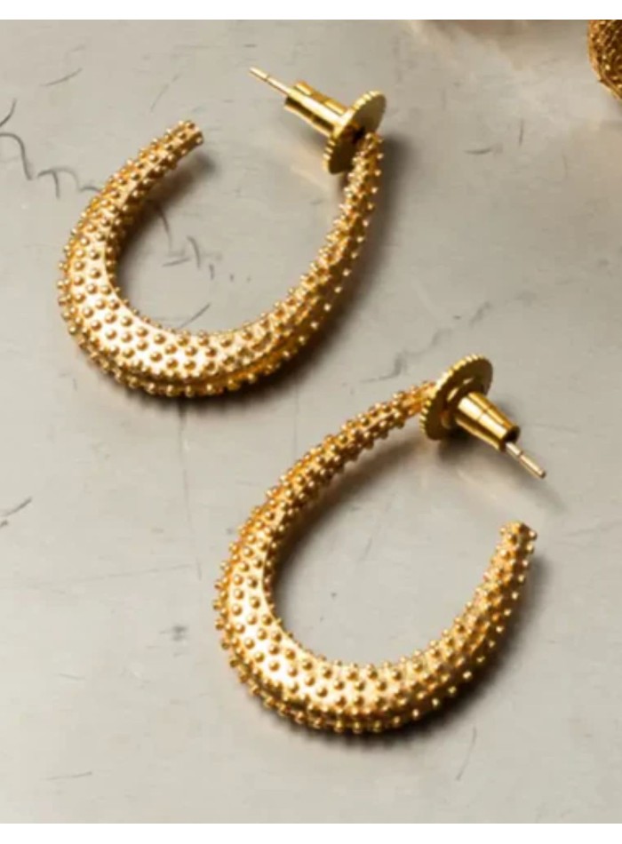 Medium-sized gold hoop earrings with an oval...
