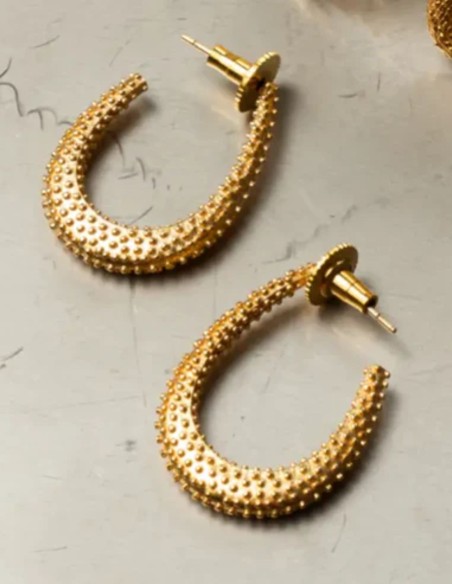 Medium-sized gold hoop earrings with an oval design