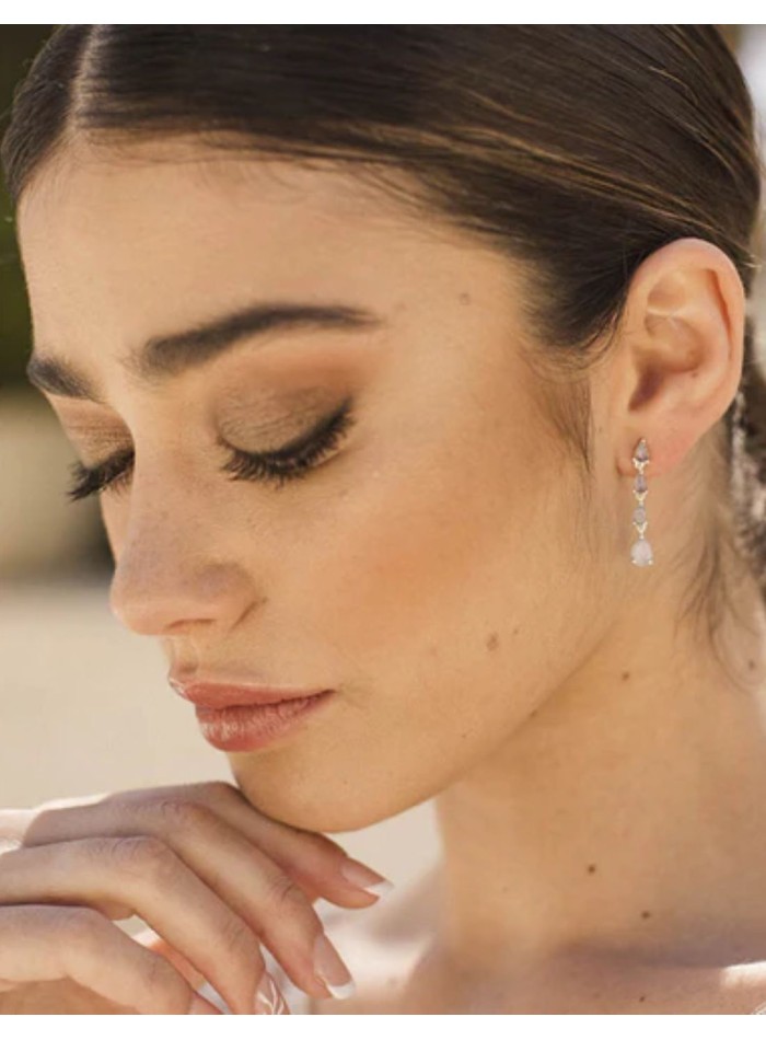 Long silver earrings with teardrop-shaped stones
