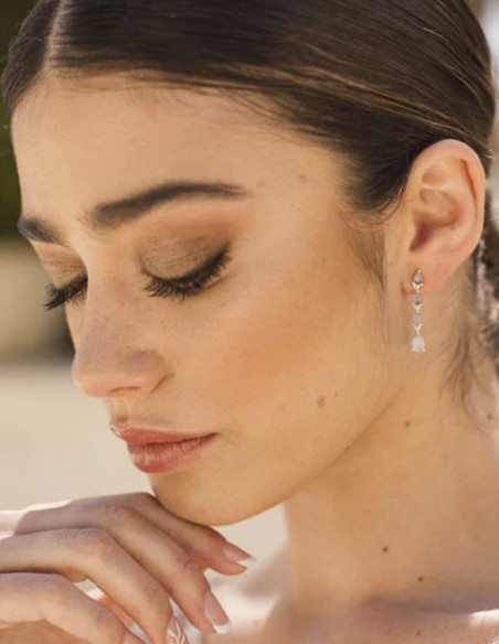 Long silver earrings with teardrop-shaped stones