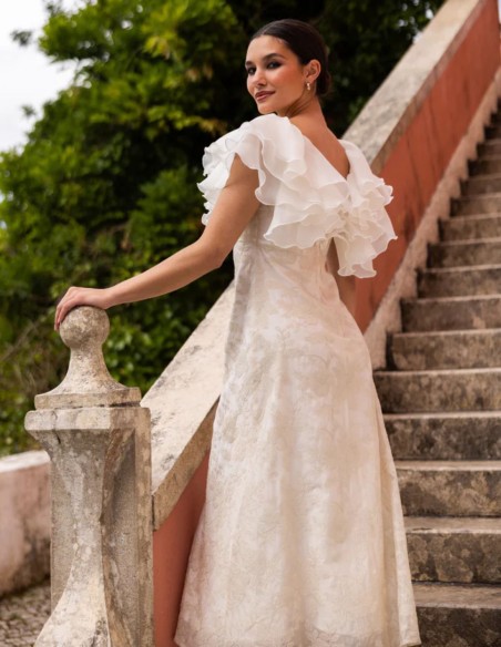 Ivory embroidered midi dress with an embellished neckline