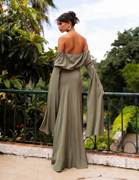 Long bohemian-style guest dress with long cape sleeves