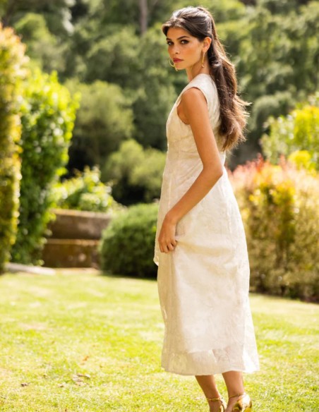 Ivory midi dress with embroidery and a V-neckline