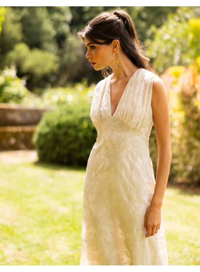 Ivory midi dress with embroidery and a V-neckline