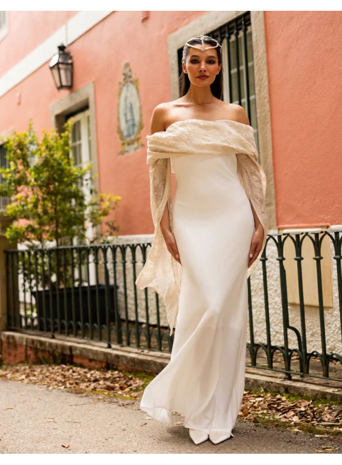 Long wedding dress with cap sleeves featuring...
