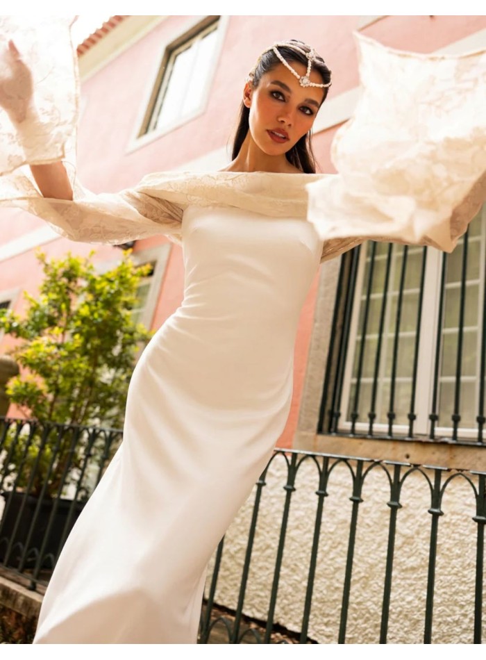 Vestido largo de novia blanco con mangas capa largas