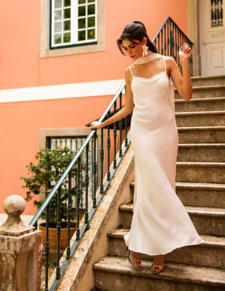 Long lingerie-style dress with thin straps and a semi-draped neckline