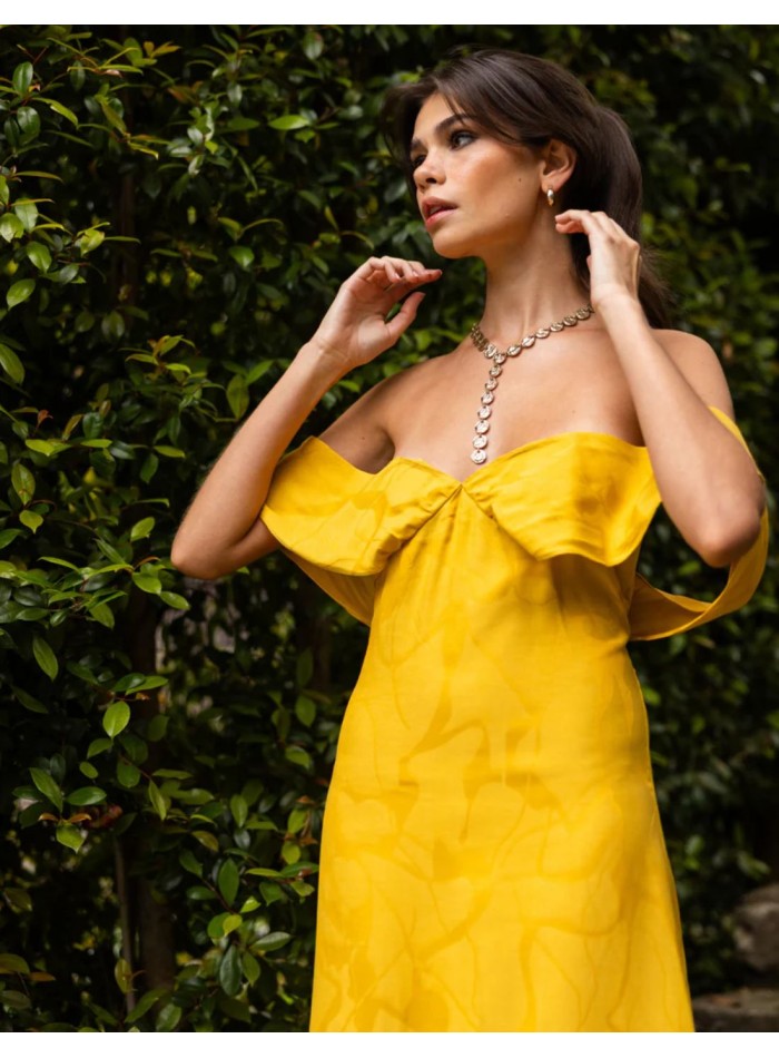 Long saffron-yellow dress with a subtle print...