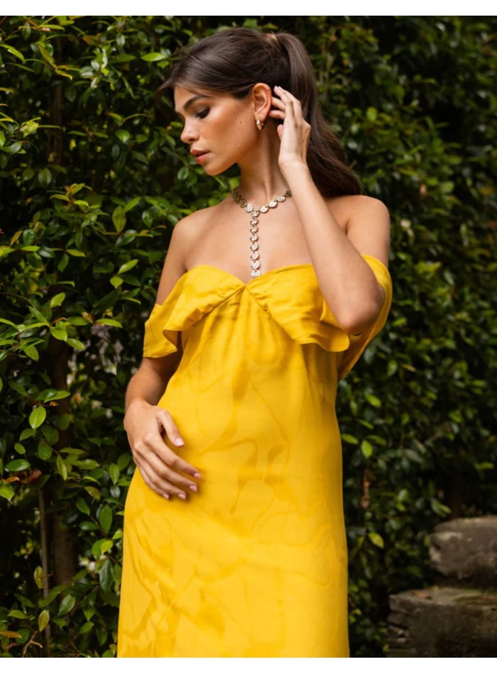 Long saffron-yellow dress with a subtle print...