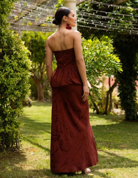 Mahogany-colored strapless top with a peplum ruffle