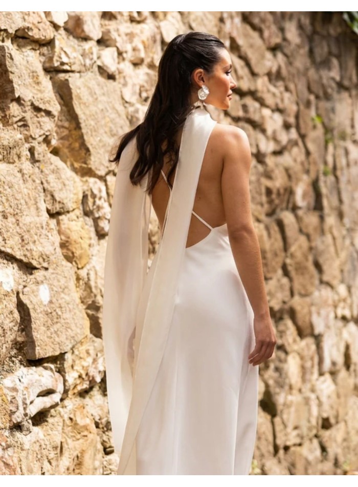 White lingerie-style dress with a draped...