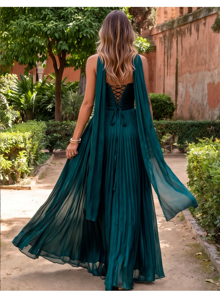 long emerald green evening gown combines elegance, sophistication