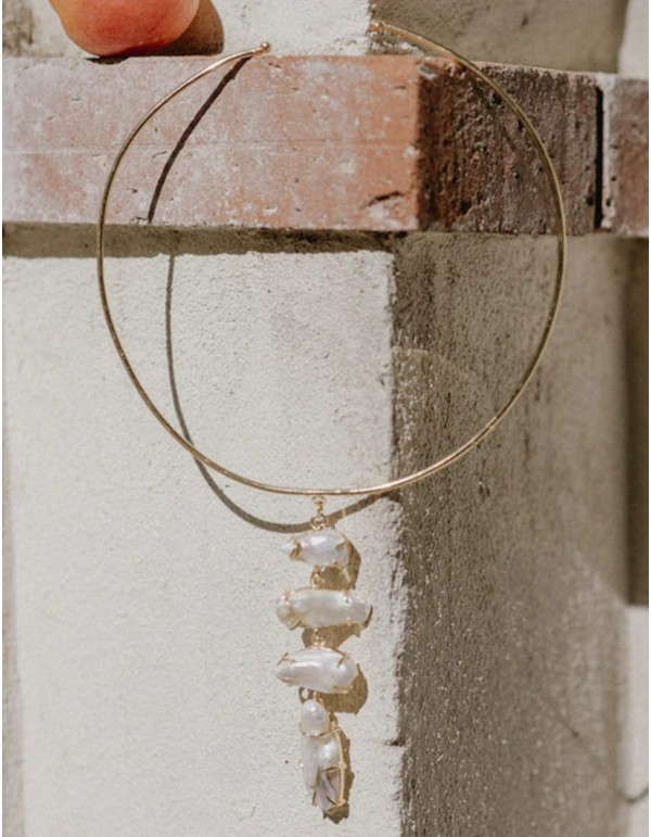 Handcrafted necklace with a central ring and dangling stones 2