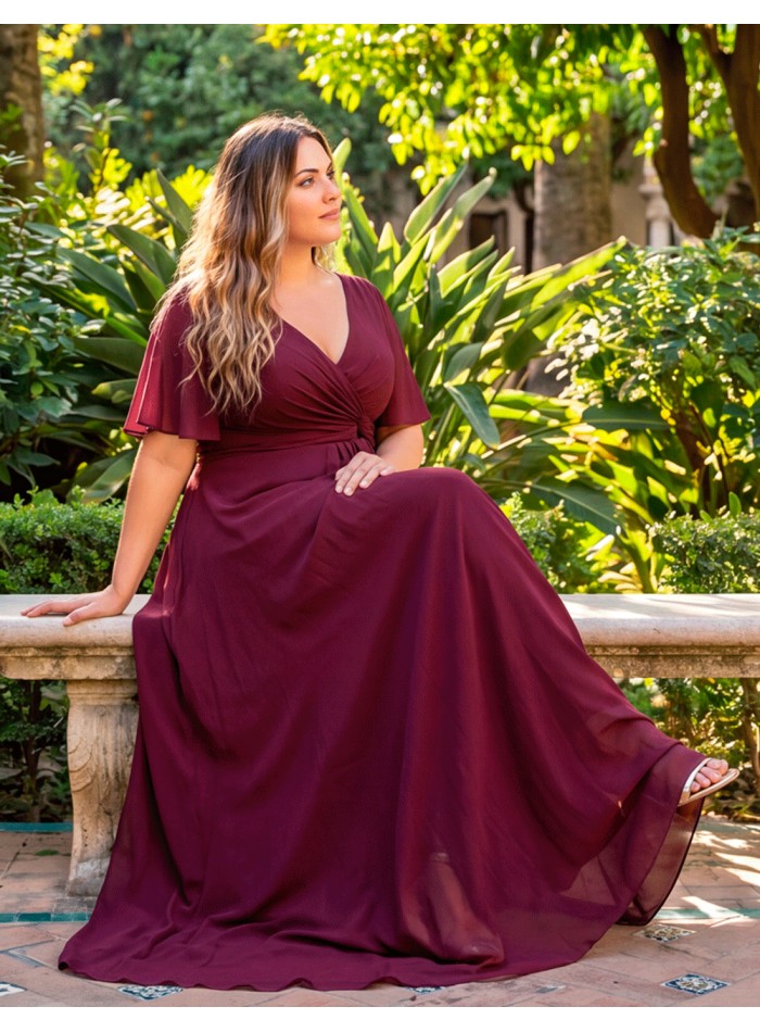 An elegant, flattering burgundy dress for curvy guests—a plus-size party dress