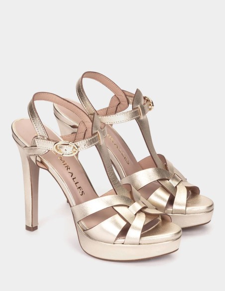 Platinum-colored party sandals with heels and a platform