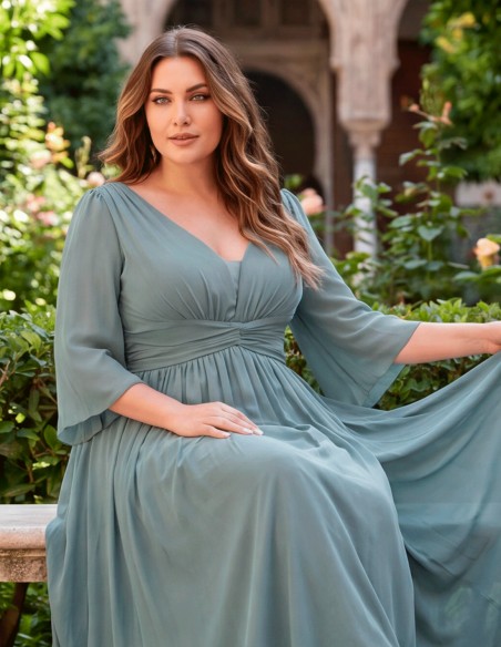 The smoke-blue dress in plus sizes is perfect for guests looking for elegance and comfort