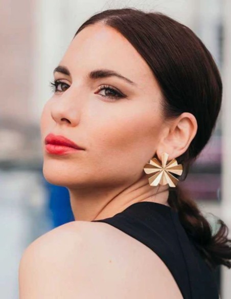 Large gold flower-shaped earrings