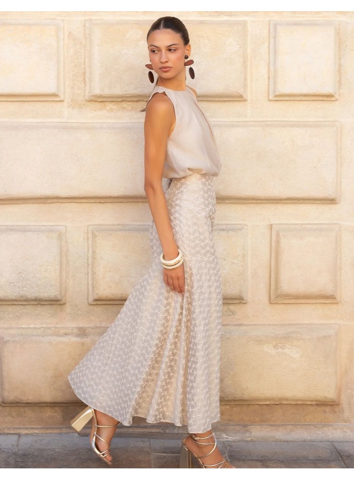 Short, pleated blouse for a wedding guest