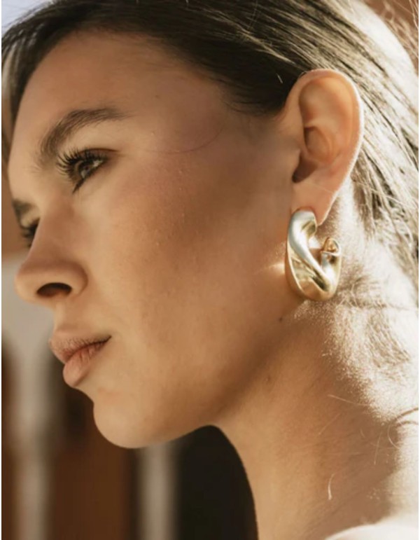Large gold hoops with an irregular design