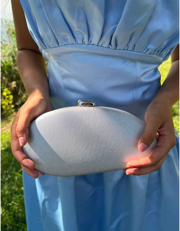 Oval silver clutch with a glossy finish 2