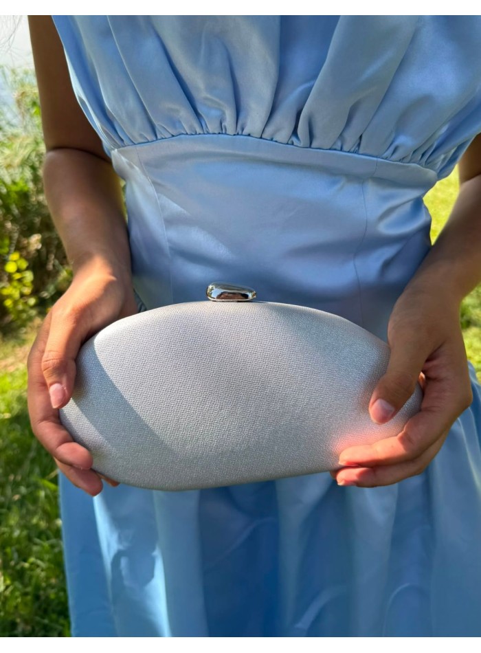 Oval silver clutch with a glossy finish