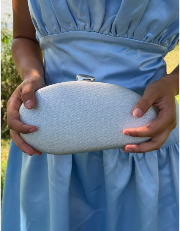 Oval silver clutch with a glossy finish