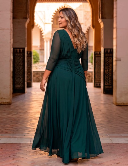 A plus-size long guest dress designed to keep you feeling comfortable and elegant throughout the entire celebration.