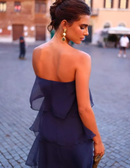 Long dress with a strapless neckline and ruffles
