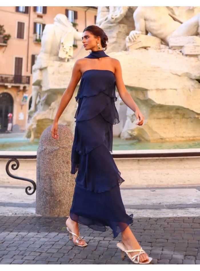 Long dress with a strapless neckline and ruffles