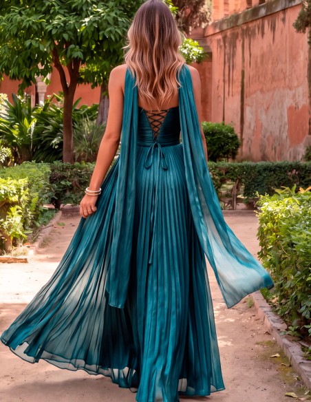 long emerald green evening gown combines elegance, sophistication