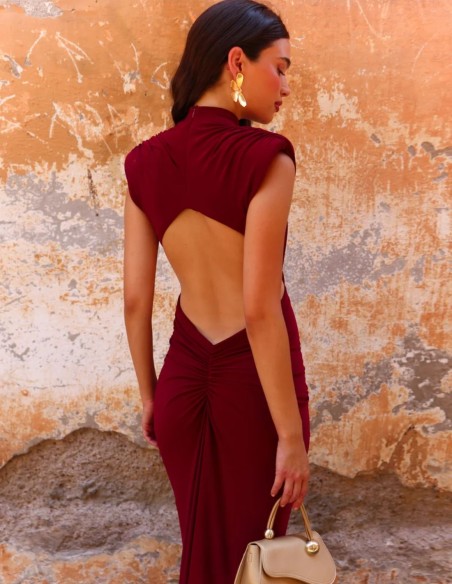 Maxi-length dress with a high neckline and shoulder pads