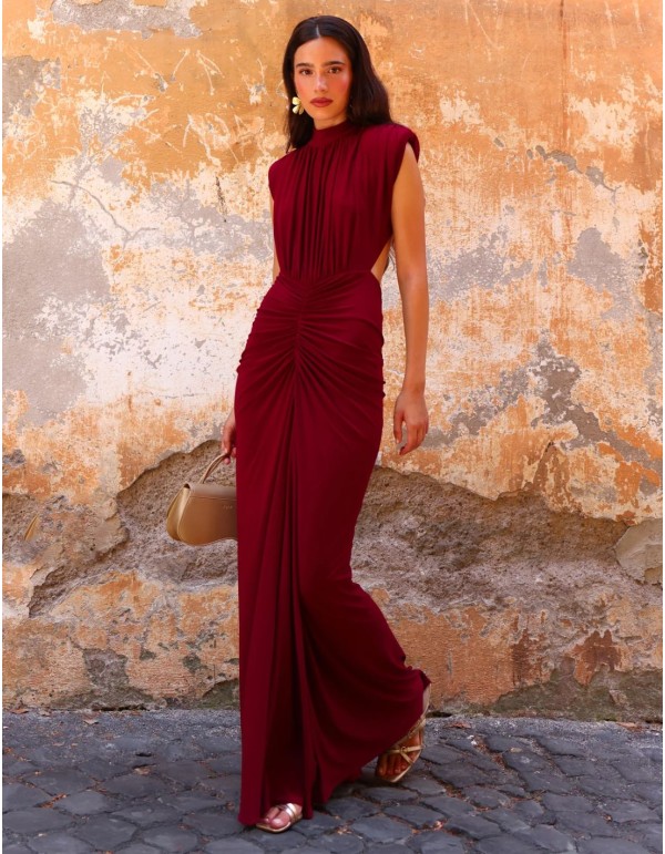 Maxi-length dress with a high neckline and shoulder pads