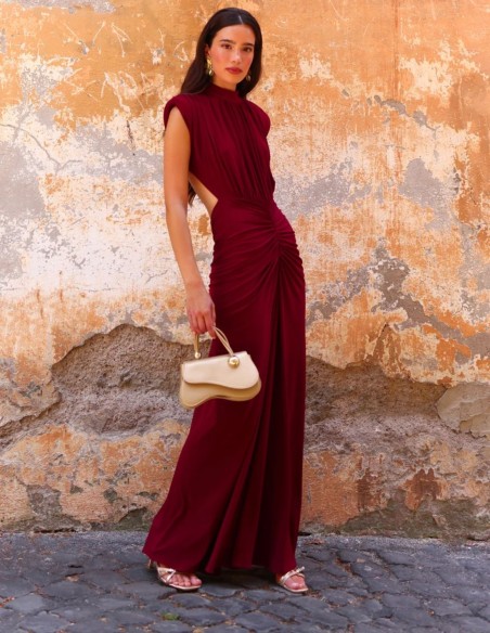 Maxi-length dress with a high neckline and shoulder pads