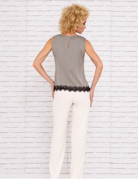 Sleeveless party blouse with lace detail at INVITADISIMA