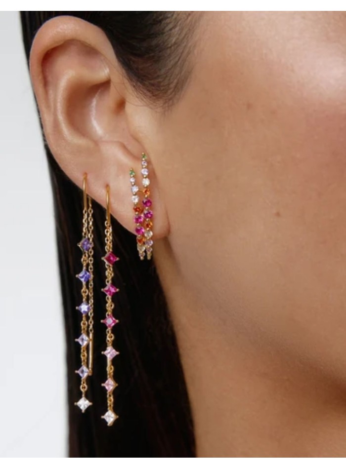 Long gold earrings with purple cubic zirconia...