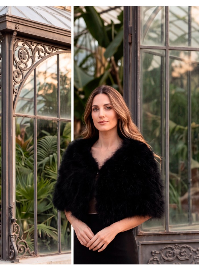 A black feather stole—sophisticated, timeless, and exceptionally versatile. Hand-dyed using traditional techniques,