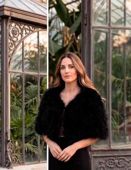 A black feather stole—sophisticated, timeless, and exceptionally versatile. Hand-dyed using traditional techniques,