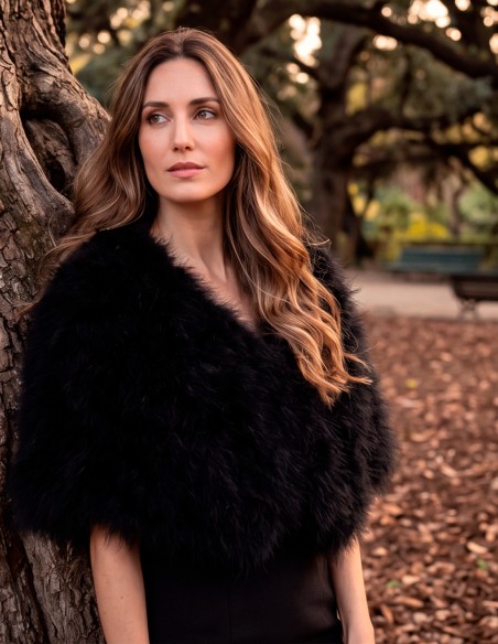 black feather stole is one of those pieces that can completely transform an outfit