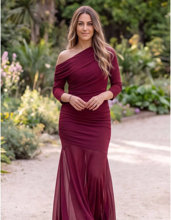 Long burgundy dress with long sleeves and an asymmetrical...