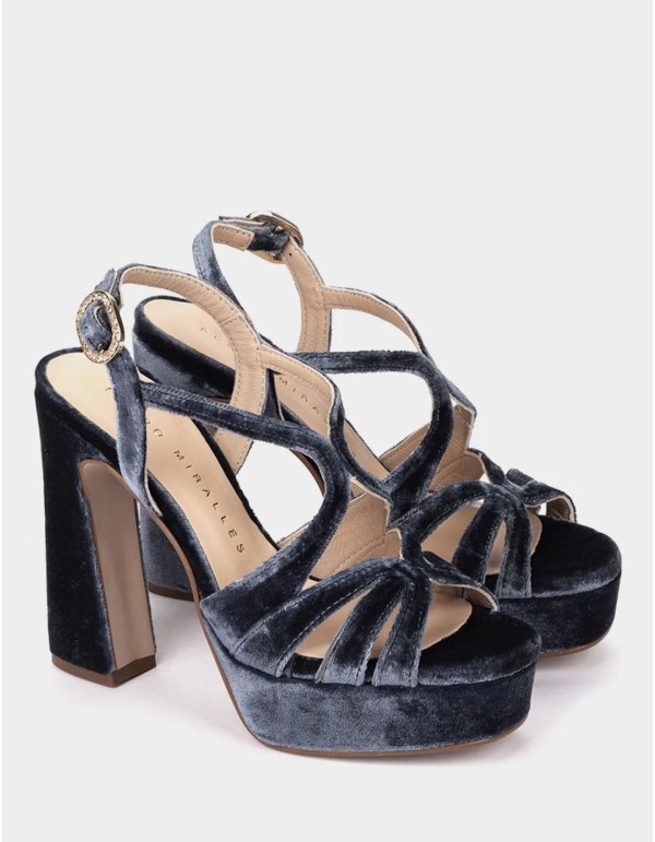 Navy blue velvet sandals with a sparkly buckle