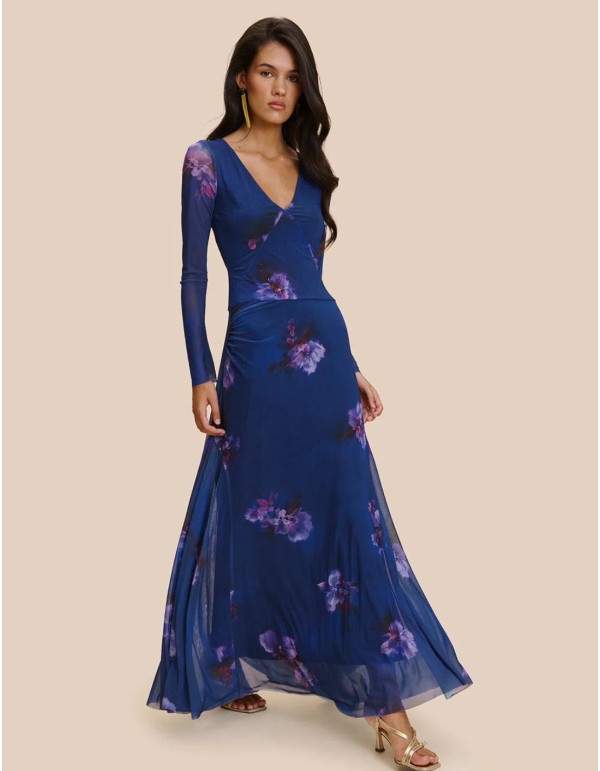 Robe longue bleue à motifs, avec des manches longues...
