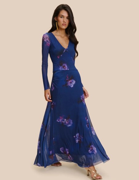 Long blue printed dress with semi-sheer long sleeves and a straight-cut skirt