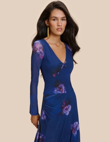 Long blue printed dress with semi-sheer long sleeves and a straight-cut skirt
