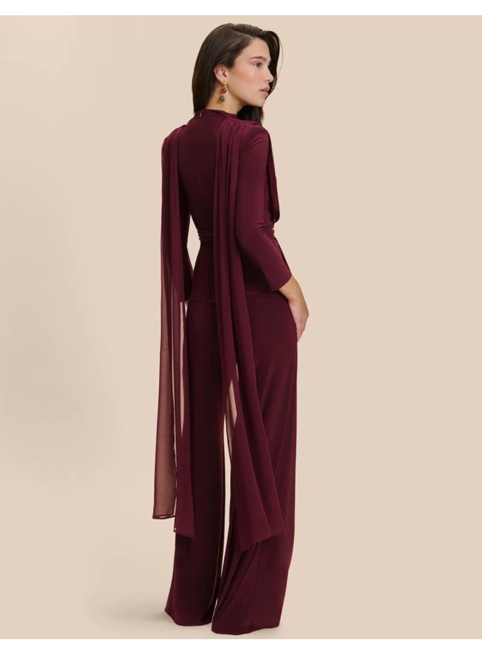 Blouse à manches longues, col fermé et ceinture